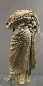 Terracotta female figure wearing a chiton and himation, Cnidus, c. 330 BCE 